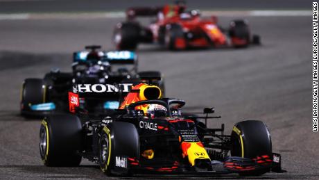 Max Verstappen driving the (33) Red Bull Racing RB16B Honda leads Lewis Hamilton during the F1 Grand Prix of Bahrain at Bahrain International Circuit on March 28, 2021.