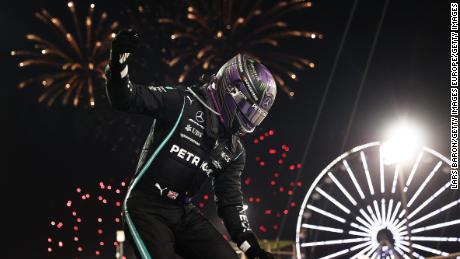 Lewis Hamilton celebrates after winning the Bahrain GP.