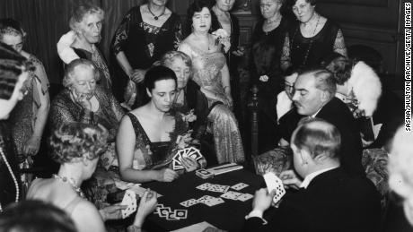 Four people, pictured here on November 29, 1930, playing Bridge.