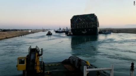 A video sent to CNN from employees working on the rescue operation shows the back of the Ever Given dislodged from the Suez Canal bank on March 29.