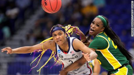 SAN ANTONIO, TEXAS - MARCH 29: Queen Egbo #25 of the Baylor Lady Bears and Aaliyah Edwards #3 of the UConn Huskies battle for the ball during the second half in the Elite Eight round of the NCAA Women&#39;s Basketball Tournament at the Alamodome on March 29, 2021 in San Antonio, Texas. (Photo by Carmen Mandato/Getty Images)