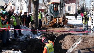 Workers in Flint, Michigan, prepare to replace a lead water service line pipe in 2016. Biden&apos;s plan aims to replace all of the nation&apos;s lead pipes and services lines.