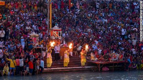 Hindu devotees attend evening prayers during Kumbh Mela in Haridwar on March 11.