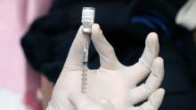 NEW YORK, NEW YORK - MARCH 26: A pharmacist prepares the Pfizer vaccine at a pop-up vaccination clinic in Chinatown on March 26, 2021 in New York City. In an effort to get more New Yorkers vaccinated against COVID-19, New York City has opened a series of pop-up vaccination sites. Many of the hubs have been placed in areas that are best to address socio-economic disparities.  (Photo by Spencer Platt/Getty Images)