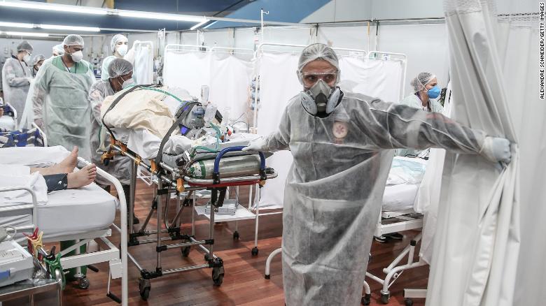 Overstretched health workers describe battling Brazil&#39;s worst Covid-19 wave yet