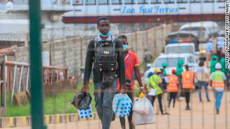 Internally displaced people arrive in Pemba by boat on April 1, 2021, from the coasts of Palma.