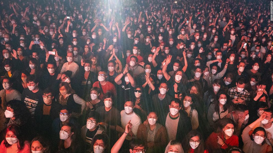 People in Barcelona, Spain, attend a concert for the rock group Love of Lesbian on March 27. Fans had to take a same-day Covid-19 test before attending the show, which was permitted by Spanish health authorities.