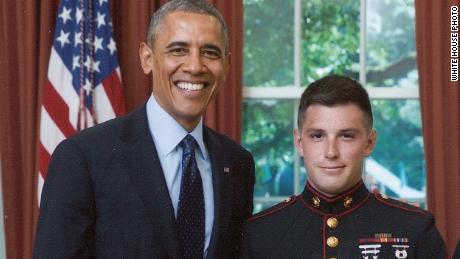 Trevor Reed who is being held in Russia, pictured with former President Barack Obama.