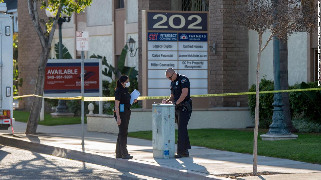The gates were locked, a boy dying in a woman's arms inside. This is what police have learned about the mass shooting in Orange, California