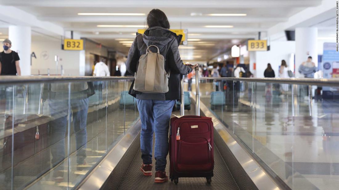 Fully vaccinated people can resume travel at low risk to themselves, new CDC guidance says