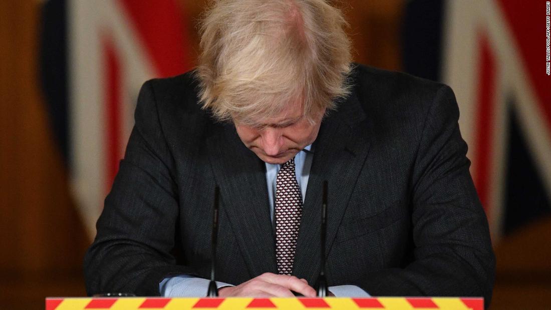 British Prime Minister Boris Johnson reacts during a Covid-19 news conference on January 26. &lt;a href=&quot;https://www.cnn.com/2021/01/26/uk/uk-covid-19-pandemic-response-intl-gbr/index.html&quot; target=&quot;_blank&quot;&gt;The virus at that point had killed 100,000 people in the United Kingdom.&lt;/a&gt;