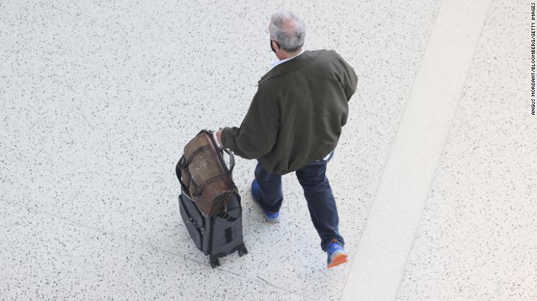 A traveler walks through Terminal 5 at John F. Kennedy International Airport (JFK) in New York.