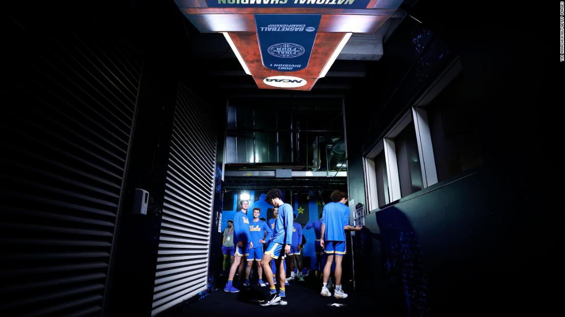 UCLA players stand in the tunnel prior to Saturday&#39;s game.