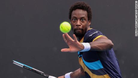 France&#39;s Gael Monfils hits a return against Finland&#39;s Emil Ruusuvuori during their men&#39;s singles match on day one of the Australian Open tennis tournament in Melbourne on February 8, 2021.