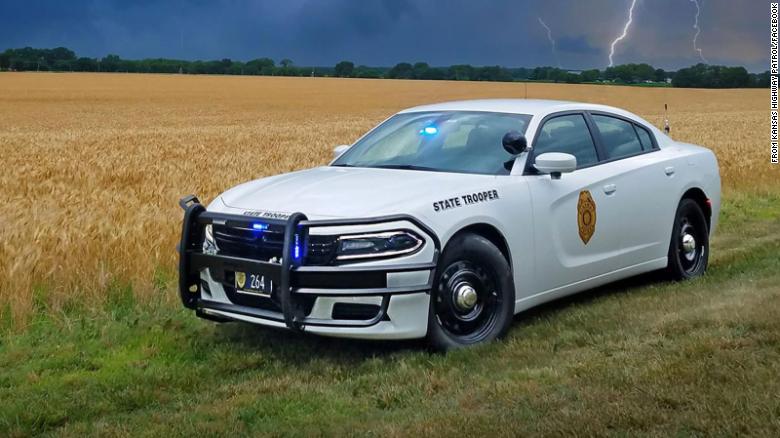 A handcuffed suspect stole a Kansas state patrol car and led troopers on a chase, highway patrol says