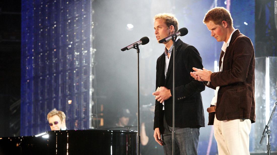 Prince William and Prince Harry speak on stage with Elton John, far left, during a concert they put on to celebrate Princess Diana in 2007. The event fell on what would have been their mother&#39;s 46th birthday.