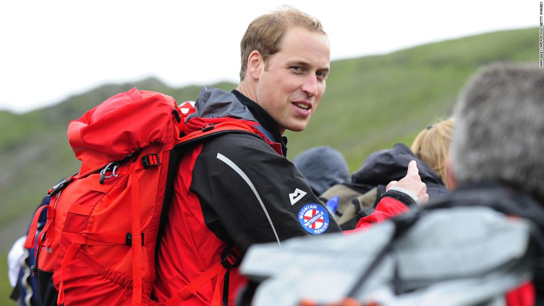 Prince William walks with a group of homeless people during a 2009 hike with Centrepoint, the United Kingdom&#39;s largest youth charity for the homeless. William became the patron of the organization in 2005.