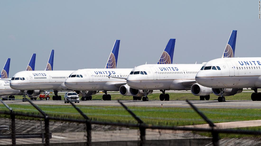 United Airlines workers protest potential layoffs after company received billions in Covid relief