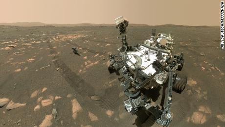 NASA's Perseverance Mars rover took a selfie with the Ingenuity helicopter, seen here about 13 feet from the rover. 