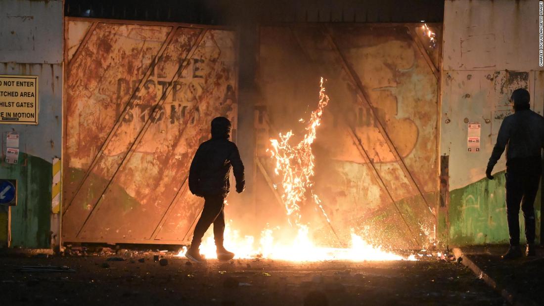 Bus torched in more Northern Ireland violence as British and Irish leaders call for calm