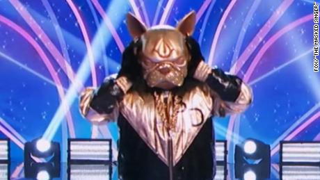 Nick Cannon Makes Big Splash In Masked Singer Return Cnn Video