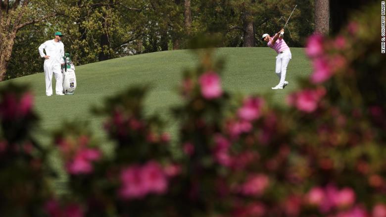 Dustin Johnson, last year&#39;s Masters champion, plays a shot on the second hole on April 8.
