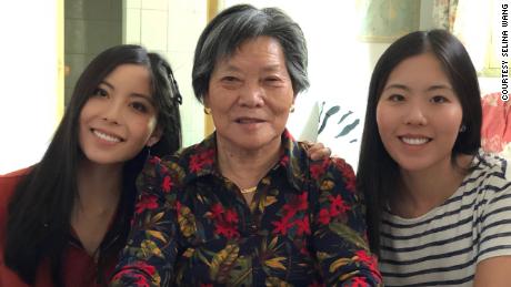 Selina Wang (left) pictured with her grandmother and her sister.