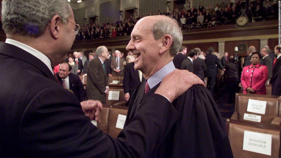 Breyer is greeted by US Secretary of State Colin Powell before President George W. Bush spoke in front of a joint session of Congress in February 2001.