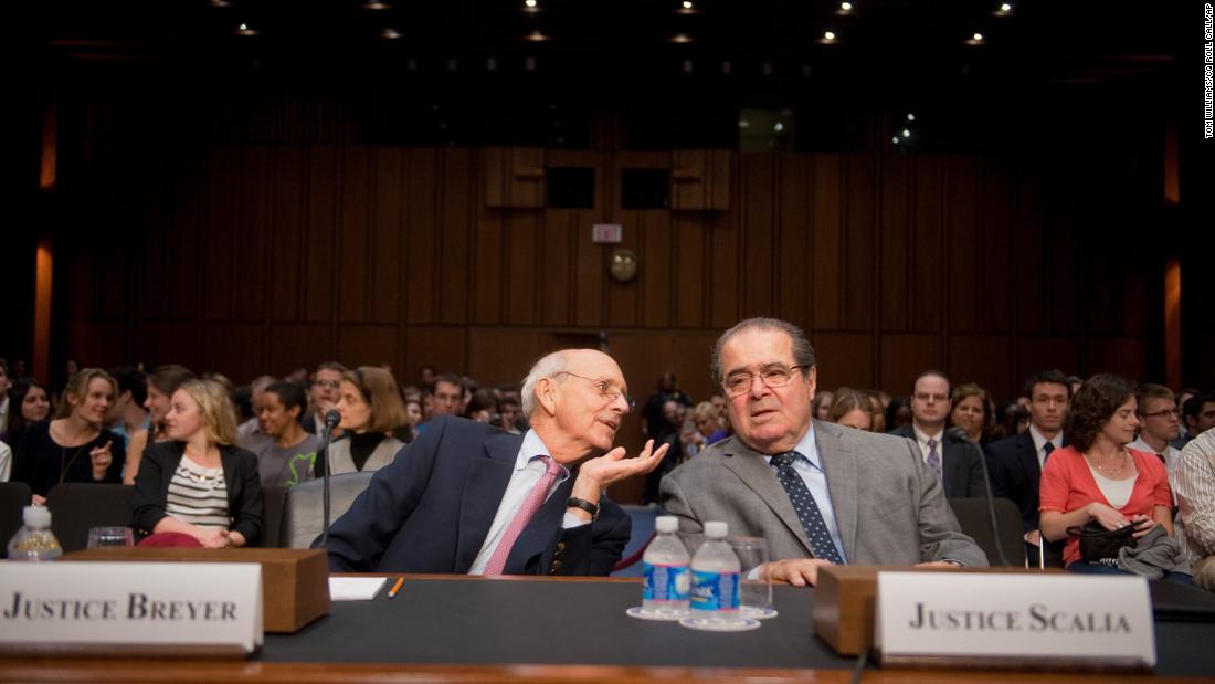 Breyer and fellow Supreme Court Justice Antonin Scalia confer in October 2011 before testifying at a Senate Judiciary Committee hearing entitled &quot;Considering the Role of Judges Under the Constitution of the United States.&quot;