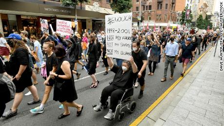 Protesters take part in the Women&#39;s March 4 Justice in Brisbane, Australia, on 15 March.