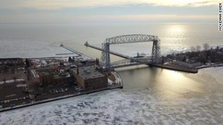 Lake Superior contains roughly 10% of world's accessible drinking water and is the largest of the Great Lakes. The Aerial Lift Bridge raises for ships entering the harbor from Lake Superior.