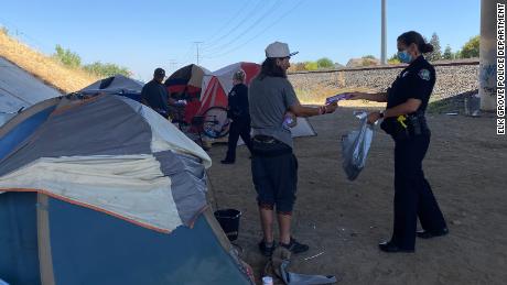 A California town is paying its homeless to clean their encampment sites