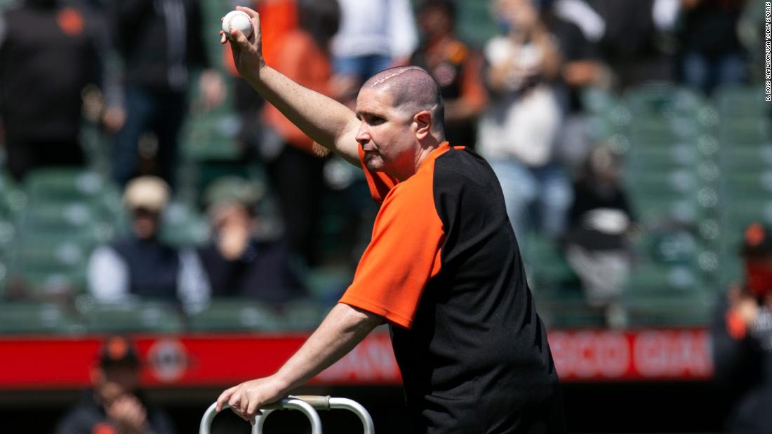 Giants fan throws ceremonial first pitch 10 years after a near-fatal attack