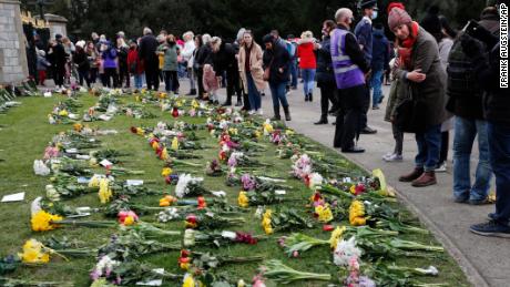 Flowers are left at Windsor Castle&#39;s Cambridge Gate on Saturday, April 10.