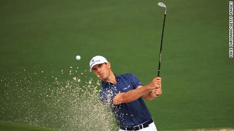 US golfer Billy Horschel plays a shot from a bunker on the second hole during the third round of the Masters on Saturday, April 10, in Augusta, Georgia.