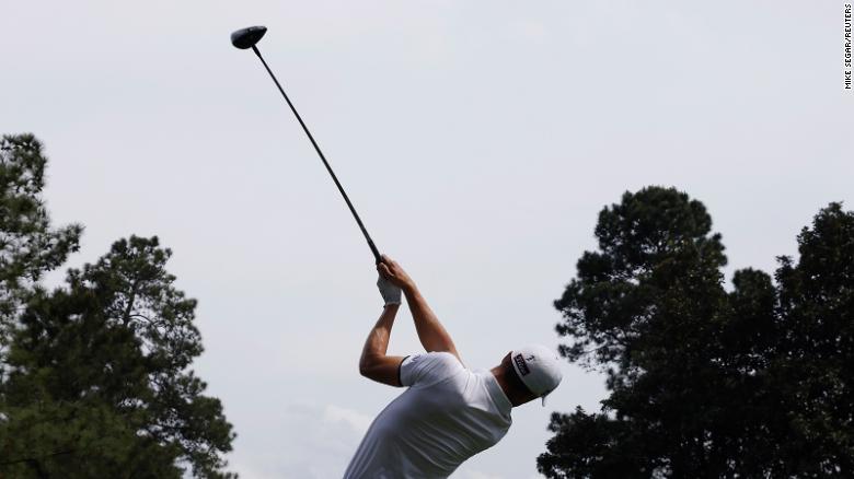 Justin Thomas hits his tee shot on the 9th hole during the third round on April 10. 