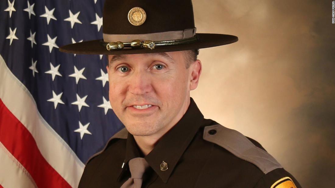 Veteran Iowa State trooper shot and killed in line of duty by barricaded man, officials say