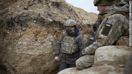 Ukraine&#39;s President heads to the trenches as Russia masses its troops  