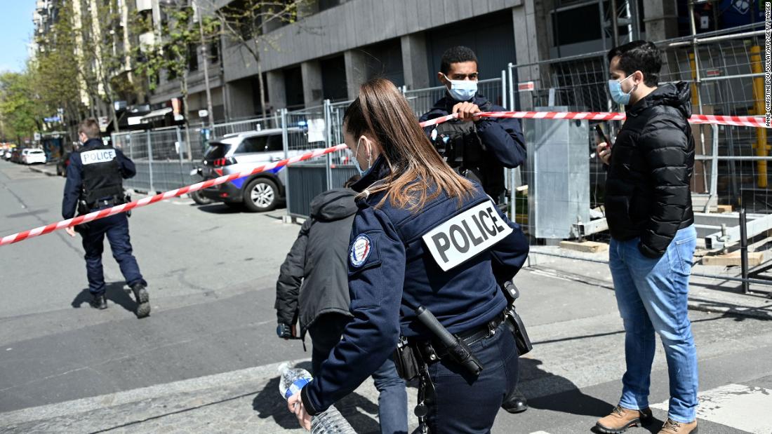 A shooter is on the run in Paris after killing one and injuring another outside a hospital