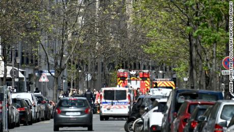 Police and firefighters outside the Henry Dunant hospital on Monday.