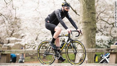 A cyclist rides in Central Park in New York City, April 10. Physical inactivity is linked to more severe Covid infection and a heightened risk of dying from the disease, a new study has found.
