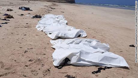 Bodies of suspected migrants who died after their boat capsized are seen arranged after they were retrieved off the Coast of Djibouti April 12, 2021.