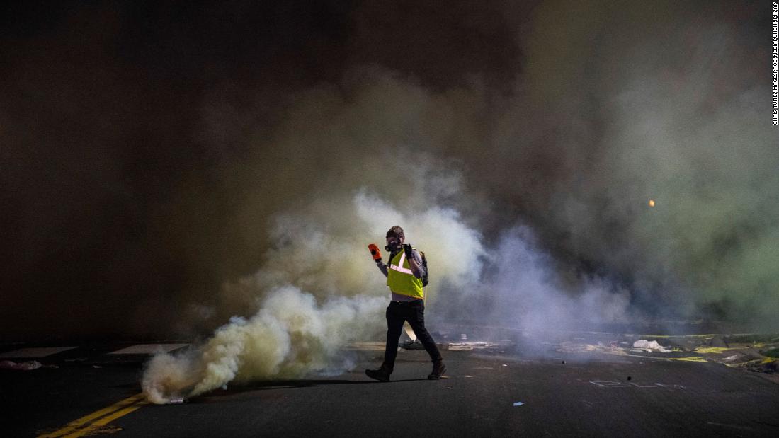 Protesters clash with police on Sunday.