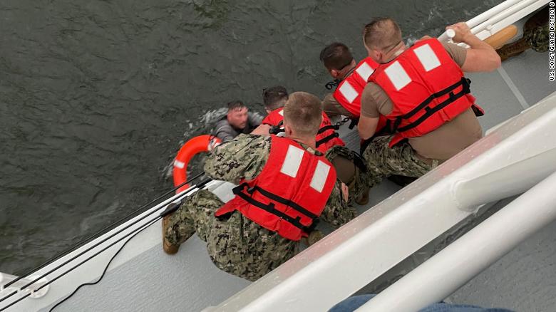 Search operations continue overnight for the 12 people still missing from capsized ship off Louisiana coast