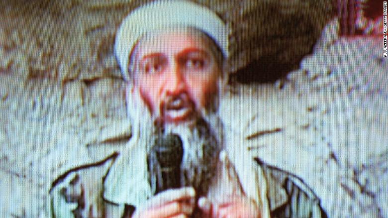 Al Qaeda leader Osama bin Laden is seen at an undisclosed location in this television image broadcast on October 7, 2001. Bin Laden praised God for the September 11 attacks and swore America &quot;will never dream of security&quot; until &quot;the infidel&#39;s armies leave the land of Muhammad.&quot;