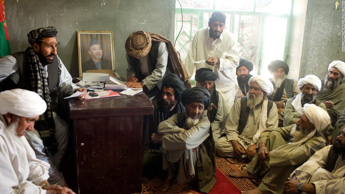 Village elders meet in Marja, Afghanistan, in March 2010.
