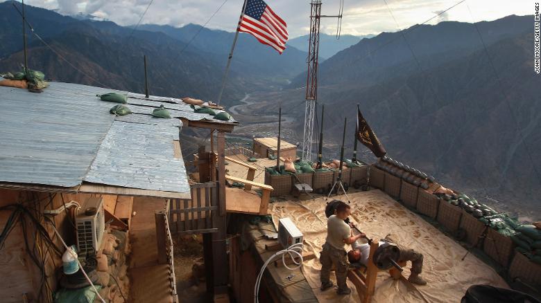 US soldiers work out at a post in Afghanistan&#39;s Kunar province in September 2011.