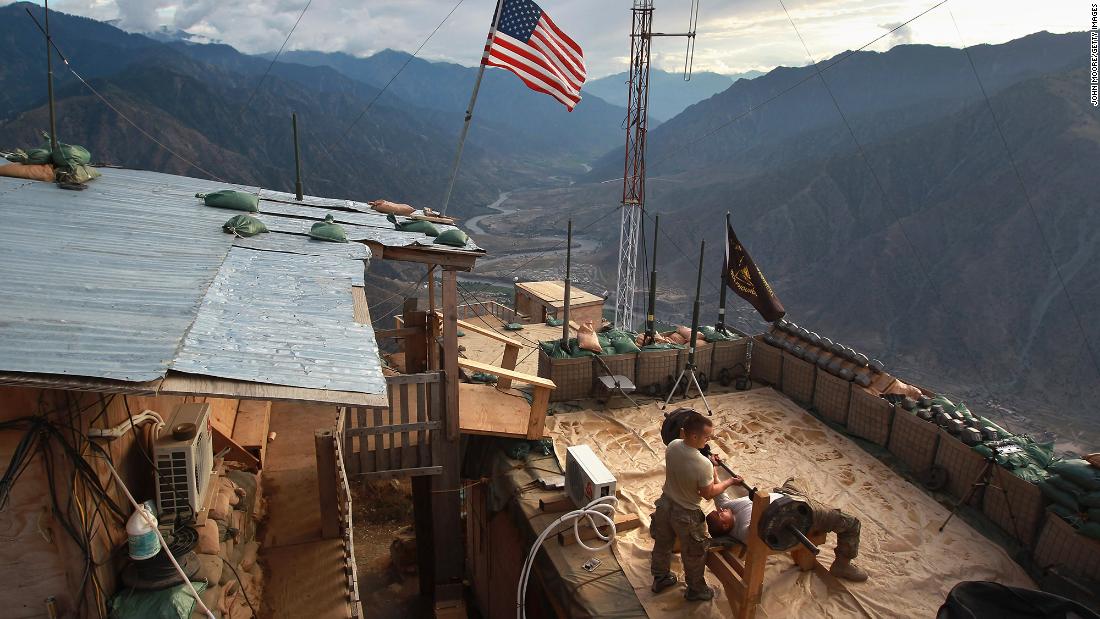 US soldiers work out at a post in Afghanistan&#39;s Kunar province in September 2011.