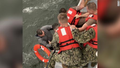 Six individuals have been rescued after a commercial vessel capsized Tuesday