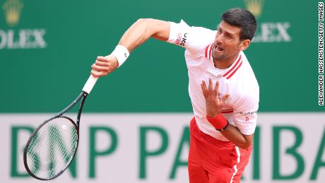 Djokovic in action during his quarterfinal match against Evans.